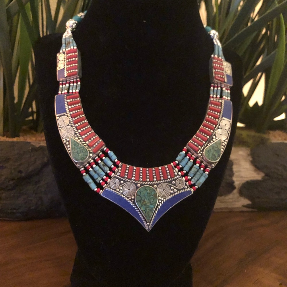 inlaid mosaic of red Coral and Turquoise gemstones